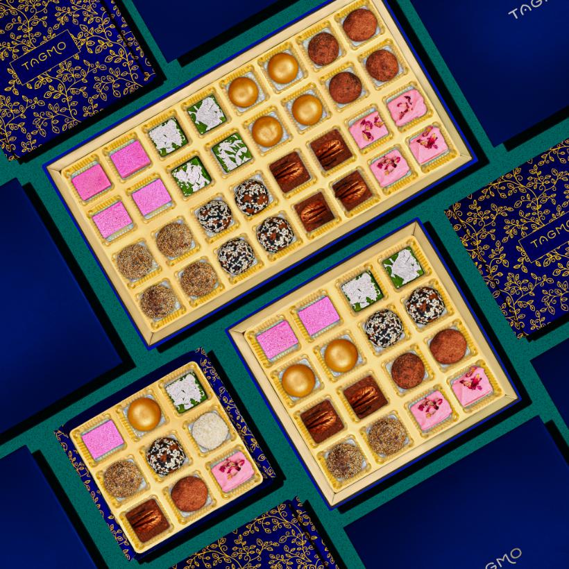 
                      
                        Assorted Diwali mithai sweets in colorful gift boxes, featuring various traditional Indian confections arranged neatly in compartments, perfect for festive celebrations and gifting
                      
                    