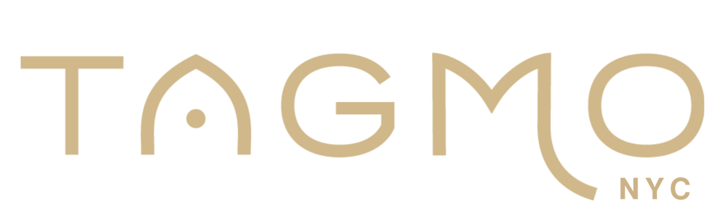 Gold 'TAGMO NYC' logo on a rich dark blue background